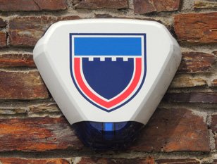 Burglar alarm bell box on a brick wall
